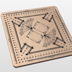 May include: A wooden cribbage board with a light brown finish. The board features a decorative black design with geometric shapes, lines, and fan-like patterns. It has numerous holes for pegs and is designed for the classic card game.