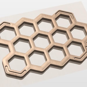 May include: A copper-colored honeycomb-shaped object with a series of hexagonal openings. The object is made of a solid material and has a smooth, clean appearance. The design is geometric and modern, suitable for decorative or functional use.