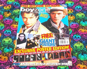 May include: A Boyzone magazine cover with two men, featuring the text "FREE BOYZONE STICKERS" and "FREE GIANT POSTERS!" The magazine is on a colorful fabric with jack-o'-lanterns.