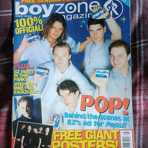 May include: A magazine cover for Boyzone, with the band members pictured. The cover includes the text "boyzone", "POP!", "FREE GIANT POSTERS!", and Pepsi branding. The magazine is issue 20, priced at £2.50.