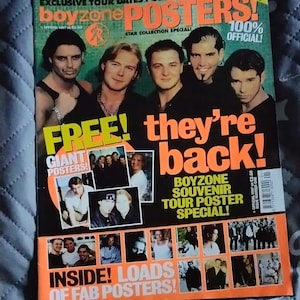 May include: A Boyzone magazine cover with the text "EXCLUSIVE TOUR DATES POSTER PULL-OUT" and "POSTERS!". The cover features a group of six men and the words "FREE! they're back!" and "INSIDE! LOADS OF FAB POSTERS!"