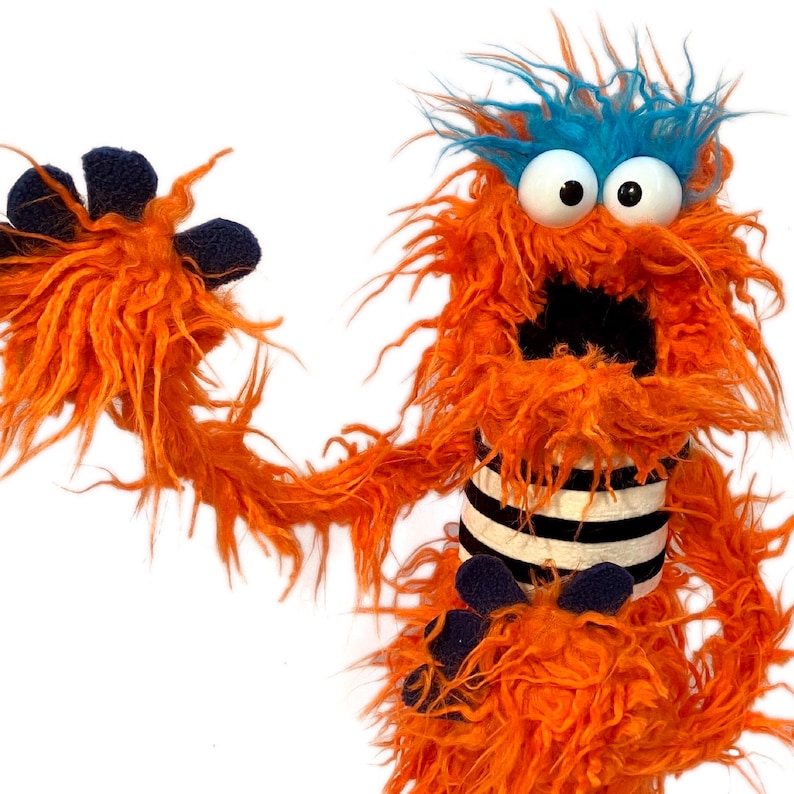 Orangefarbene Monster Handpuppe Zottel Chin Pro Bild 2