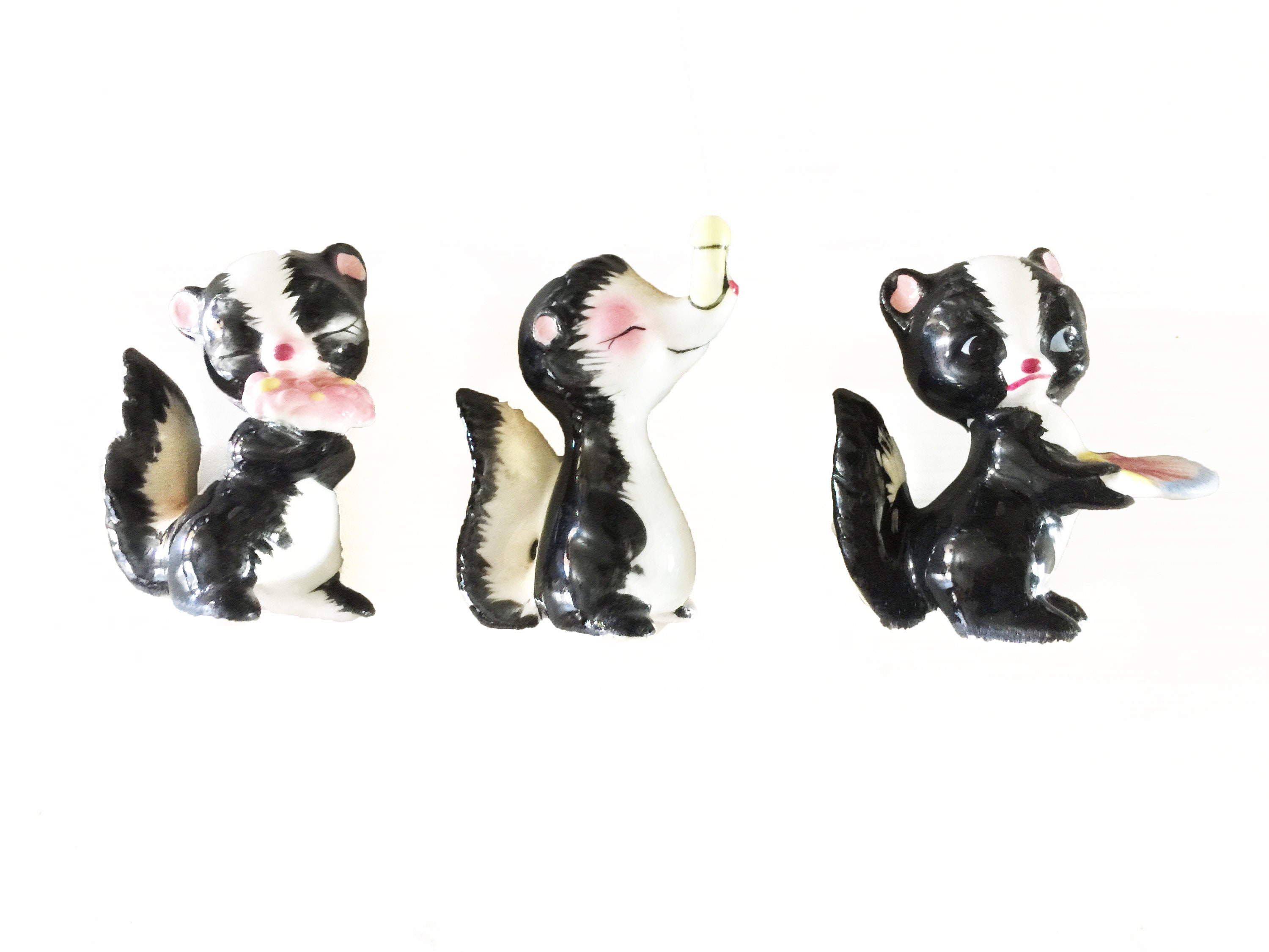 Set of 3 authentic rare mid century Disneyland hand painted porcelain skunks from the 1960's