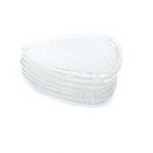 May include: A stack of six clear glass coasters with a textured surface. The coasters are shaped like a teardrop.