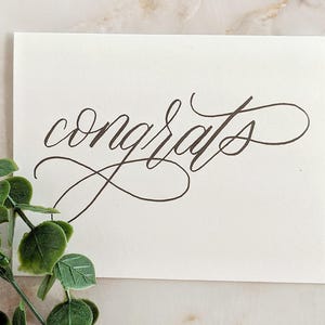 Cartão de felicitações minimalista feito à mão para casal, casamento, formatura, novo emprego, nascimento