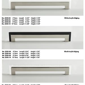May include: Cabinet hardware featuring rectangular bar pulls with white, black, and clear acrylic edging. The pulls have a brushed metal finish. Sizes range from 4" to 10" bore, with lengths from 5-3/4" to 11-3/8" and a height of 1-7/8".
