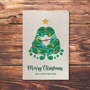 Joyeux Noël arbre empreinte de pas carte de voeux artisanat souvenir cadeau empreinte de main bébé enfant bambin projet artistique préscolaire activité bricolage