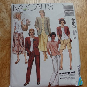 May include: A sewing pattern for a jacket, blouse, and pants. The pattern is for size 10 and is from McCall's. The pattern includes instructions for making bust darts for C and D cup sizes.