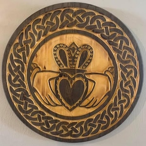 24” carved wooden claddagh wall hanging