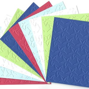 May include: A set of ten embossed cardstock sheets in various colors, including red, blue, green, and white. Each sheet features a repeating pattern of embossed stars.