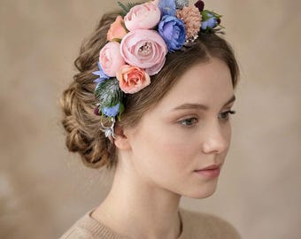 Hoofdband met roze en blauwe bloemen