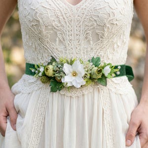 white wedding dress with green sash Cascading Ivy Off-Shoulder Dress Teuta Matoshi