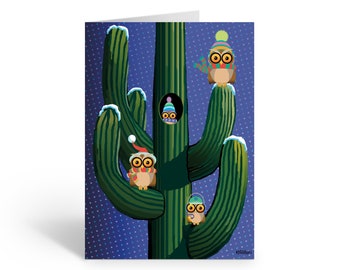 May include: A green cactus with three owls wearing winter hats and scarves. The cactus is covered in snow and the background is a blue sky with white snowflakes.