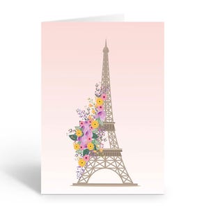 May include: A pink and white gradient background with a brown silhouette of the Eiffel Tower. The tower is decorated with a cluster of purple, pink, yellow, and green flowers.