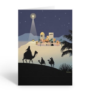 May include: A Christmas card featuring a stylized illustration of the Three Wise Men on camels, silhouetted against a desert landscape. A bright star shines over a town with tan buildings and palm trees under a dark blue sky.