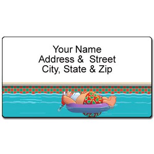 May include: A rectangular label with the text "Your Name Address & Street City, State & Zip". The label features a cartoon of a person in a Santa hat and Christmas swim trunks floating in a pool.
