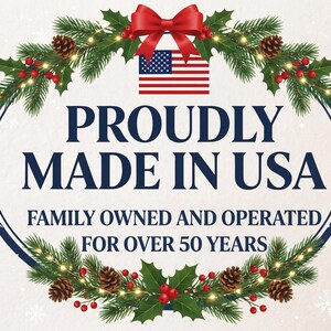 May include: A graphic design featuring a red bow at the top, a United States flag, and a festive wreath of pine branches, pinecones, and red berries. The text reads PROUDLY MADE IN USA and FAMILY OWNED AND OPERATED FOR OVER 50 YEARS in dark blue.
