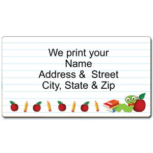 May include: A white sheet of paper with blue lines, resembling a notebook page. The text "We print your Name Address & Street City, State & Zip" is printed in black. The bottom of the page is decorated with red apples, yellow pencils, a green worm with glasses, and a stack of books.