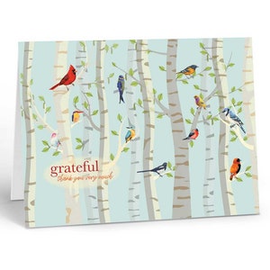May include: A thank you card with a light blue background featuring a birch tree forest with colorful birds. The text "grateful thank you very much" is written in red.