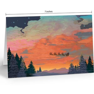 A folded Christmas card with a painted forest and sunset scene is shown with text overlays indicating it is 7 inches wide and 5 inches tall.