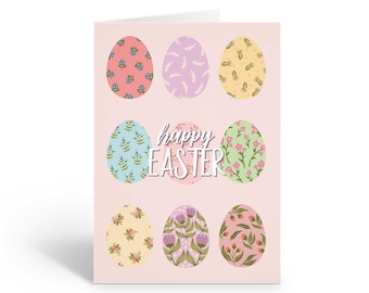 May include: A pink card with the text "happy easter" in white script. The card is decorated with eight pastel colored eggs, each with a different floral pattern.