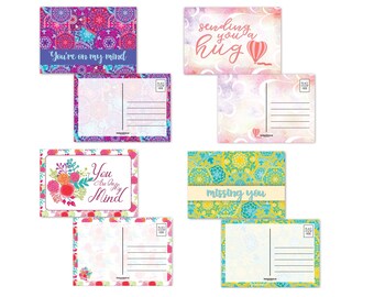 May include: Set of six blank postcards with colorful floral and geometric designs. The postcards feature the phrases "You're on my mind", "You are in my mind", "Sending you a hug", "Missing you".