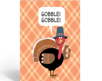 May include: Thanksgiving greeting card featuring a cartoon turkey wearing a pilgrim hat and giving a thumbs-up. The turkey has a red wattle and a brown body. A speech bubble above the turkey says "GOBBLE! GOBBLE!" The background is an orange plaid pattern.
