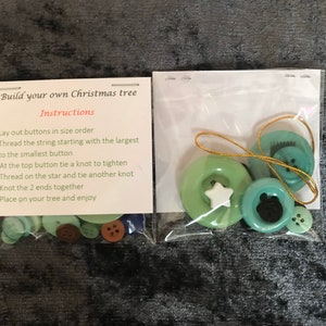 May include: A kit to make a Christmas tree decoration. It includes a string of green buttons, a white star button, and instructions on how to assemble the decoration.