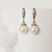 Samantha Logan reviewed Pearl Bridal Earrings Pearl Wedding Earrings Simple Bridesmaid Earrings Classic Swarovski White Ivory Pearl Earrings Wedding Jewelry