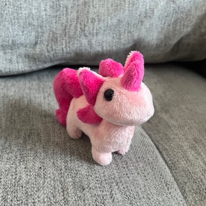 Tiny unicorn doll