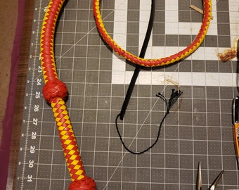 4 ft bullwhip with approx 2 ft cracker garnet and gold