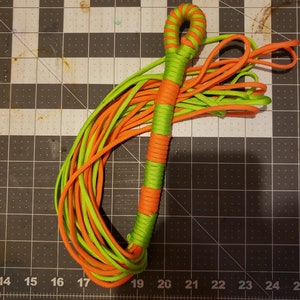 Neon green and orange paracord flogger