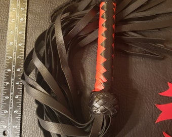 Black and red handled black falls flogger