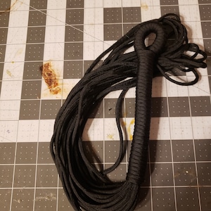 Black paracord flogger