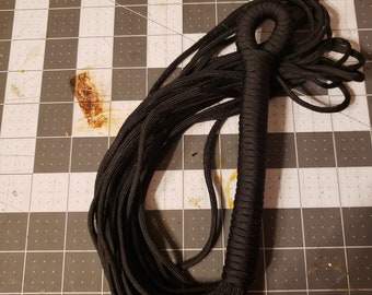 Black paracord flogger