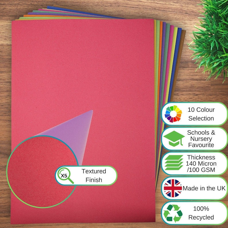 May include: A stack of multi-coloured paper sheets with a textured finish. The top sheet is pink. Text on the image includes 10 Colour Selection, Schools & Nursery Favourite, Thickness 140 Micron/100 GSM, Made in the UK, 100% Recycled, and Textured Finish.