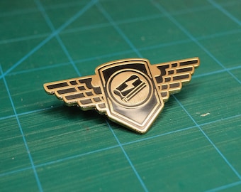Suburban Avenger Studios enamel pin