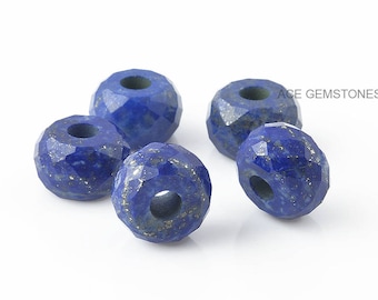 May include: Five faceted lapis lazuli beads with gold flecks. The beads are a deep blue color and have a hole in the center for stringing.