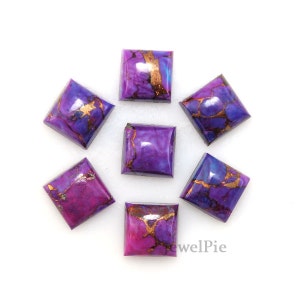 May include: Seven square-shaped purple and copper turquoise cabochons. The cabochons are approximately 1 inch in size.