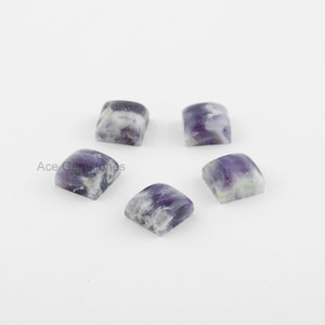 May include: Five square-shaped amethyst cabochons with a purple and white color pattern. The cabochons are approximately 10mm in size.