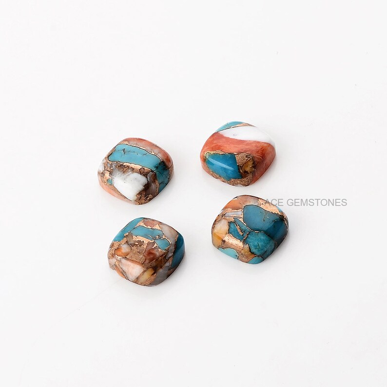 May include: Four square-shaped turquoise cabochons with copper and white accents. The cabochons are approximately 1 inch in size.