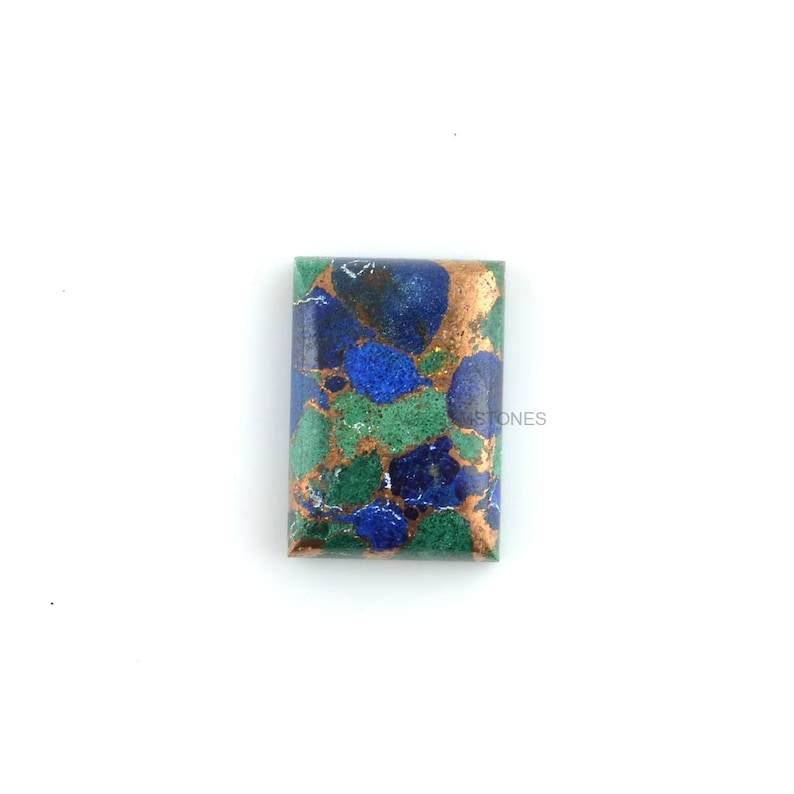 May include: A rectangular, green, blue, and copper gemstone cabochon. The gemstone has a marbled pattern with swirls of green, blue, and copper.