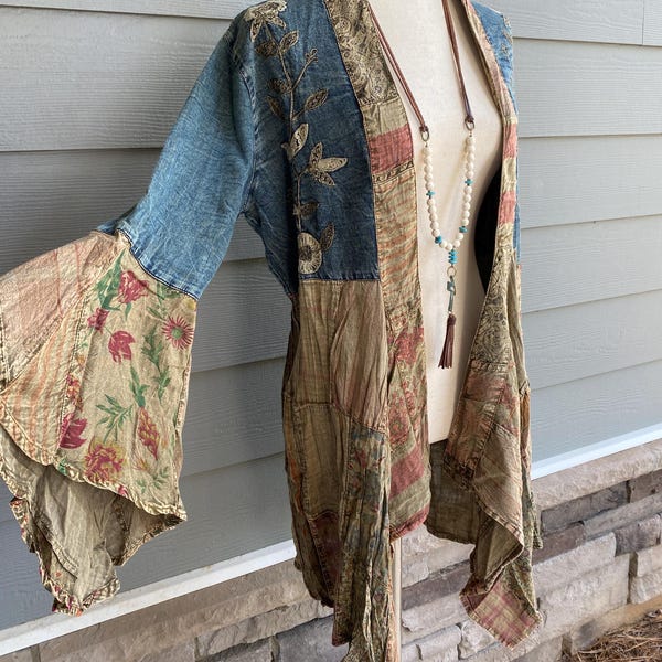 Western Boho Jacket in denim or denim wash with floral embellishments, flowy relaxed fit, concert style, festival fashion
