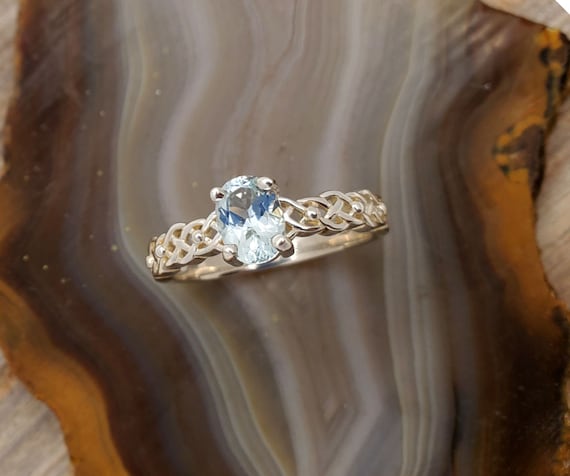 Sterling silver ring with Maine Aquamarine, low profile braided design band with Maine Aquamarine, celtic braid ring with an aquamarine.