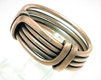 Adustable triple band ring.  . Pure copper wire wrapped ring with adjustable slided.