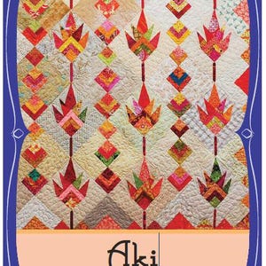 May include: A quilt pattern called "Aki" by Blue Nickel Studios. The quilt features a geometric design of colorful tulips in a repeating pattern. The quilt is made of various fabrics in shades of red, orange, yellow, green, and blue.