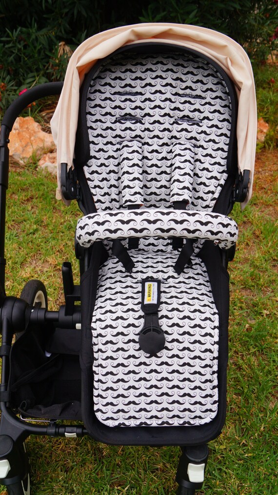 black and rose gold pram