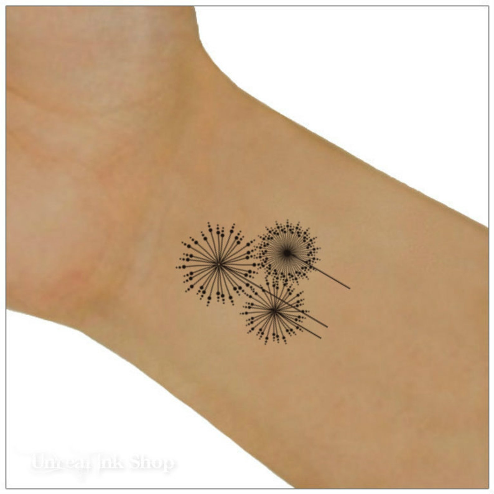 Small dandelion tattoo on wrist