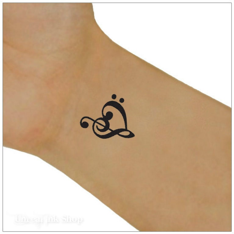 Music wrist tattoos, Tattoos for women, Music tattoo designs