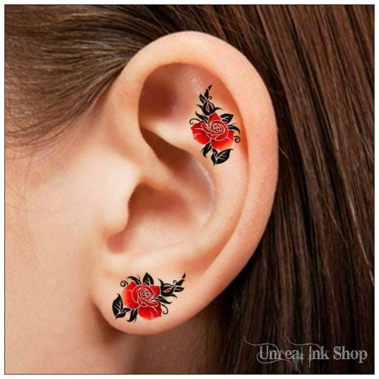 Rose tattoo behind the ear